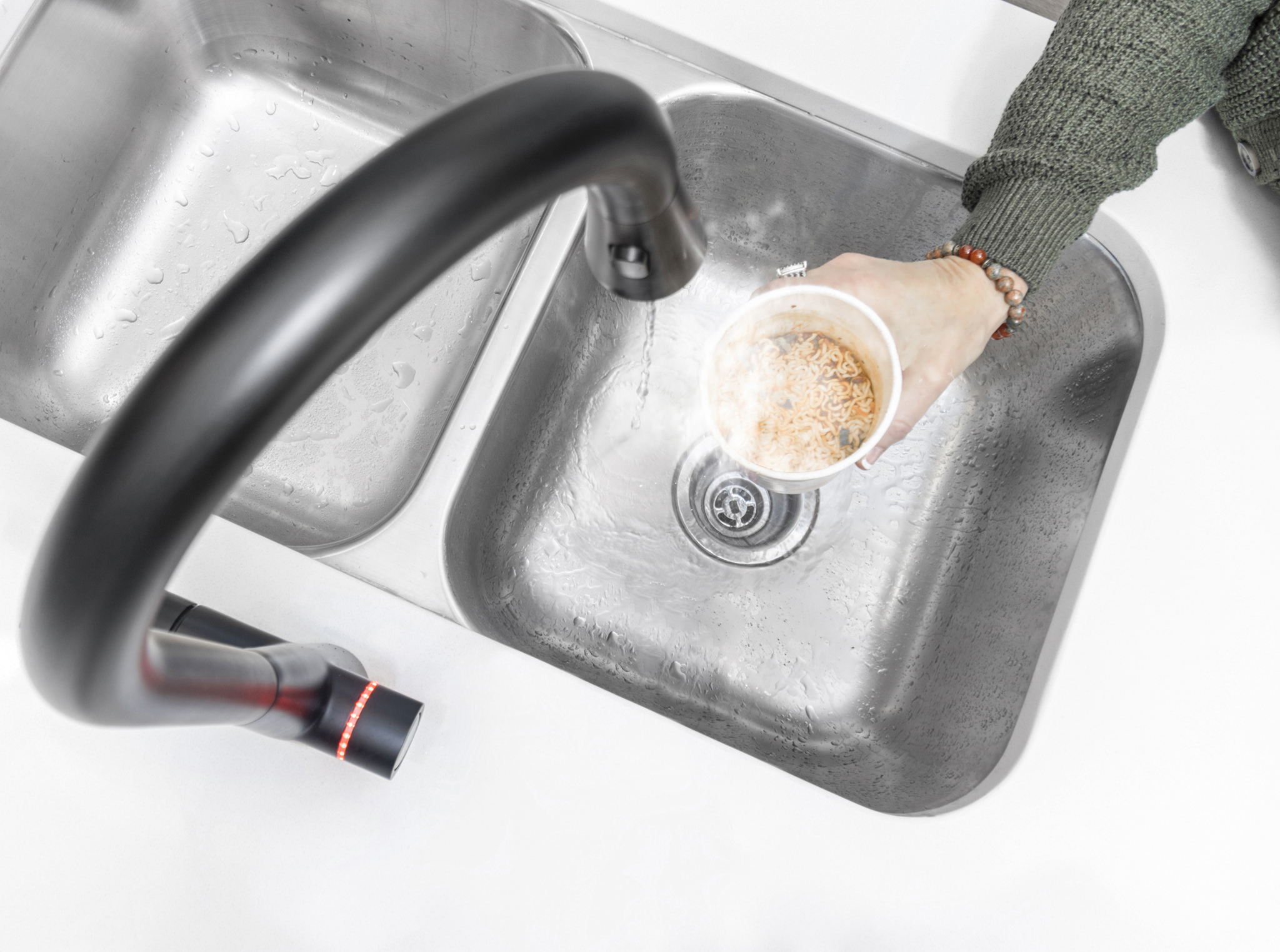 Commercial architecural photography product photo of a sink that prouce an instant cup of hot water in castle pine colorado